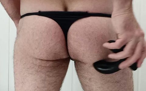 Trying on a Thong and a Toy