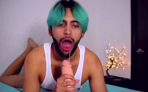 Edgy boy sucking on that dildo