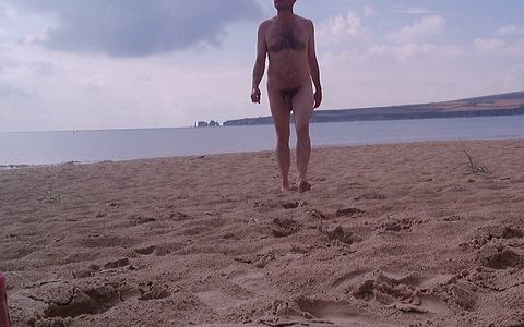 Walking naked out of the sea at nudist beach - Rockard Daddy