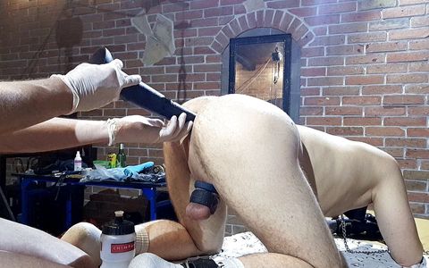 Milking with dildo in ass