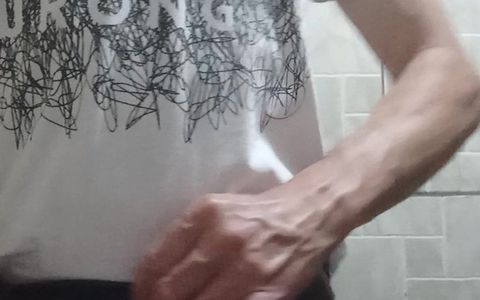 A handjob in the bathroom