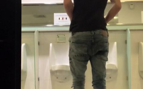 Wank in public toilet