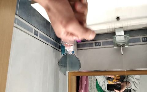 Big Cock Pisses in the Bathroom and then Jerks off with Massage Body Oil