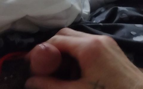 Stroking my cock.