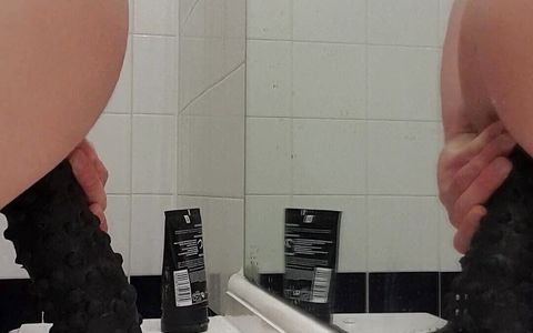 Carl Cagedwarrior Takes Huge BBC Dildo in Hotel Bathroom with Mirror Reflection