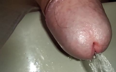 Extreme Close up Foreskin of Uncutted Cock While Peeing