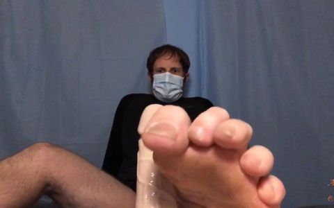 Male nurse gives patient a footjob