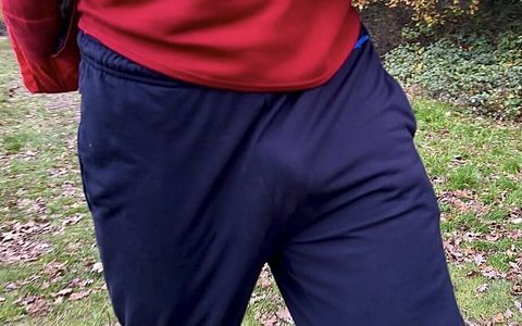 Slowmo of me with my dick flapping under my sweatpants during my morning walk in the woods