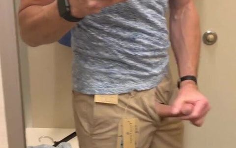 Wanking in the Clothing Store Fitting Room