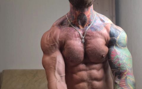 Tattooed Jock Gets Oiled up and Shows Muscles