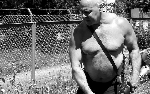 Big belly gay bear step daddy hunk muscle bear working in the garden. Film muscle gay hairy bodybuilder