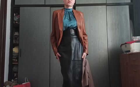 Me walking in leather skirt