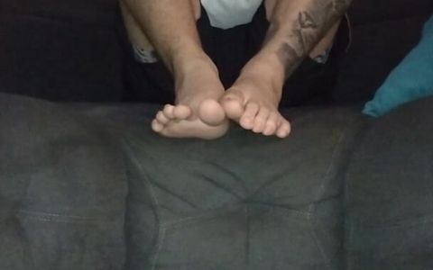 Latino Shows His Feet While Eating