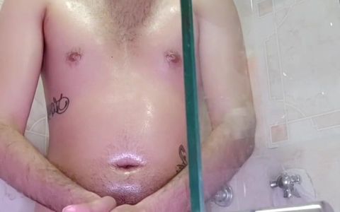 I hadn't cum in 4 days, so I got in the shower and gave myself a nice oily cock massage